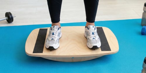 Balance board oefeningen: effectieve balance board oefeningen thuis