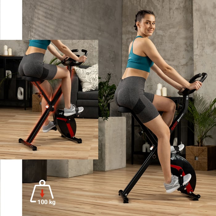 Vrouw traint op compacte HS-3020X Quest hometrainer met X-frame constructie.
